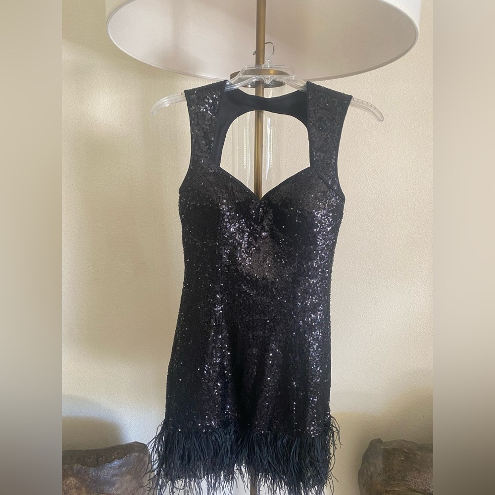 Black cocktail sequins dress by GUESS